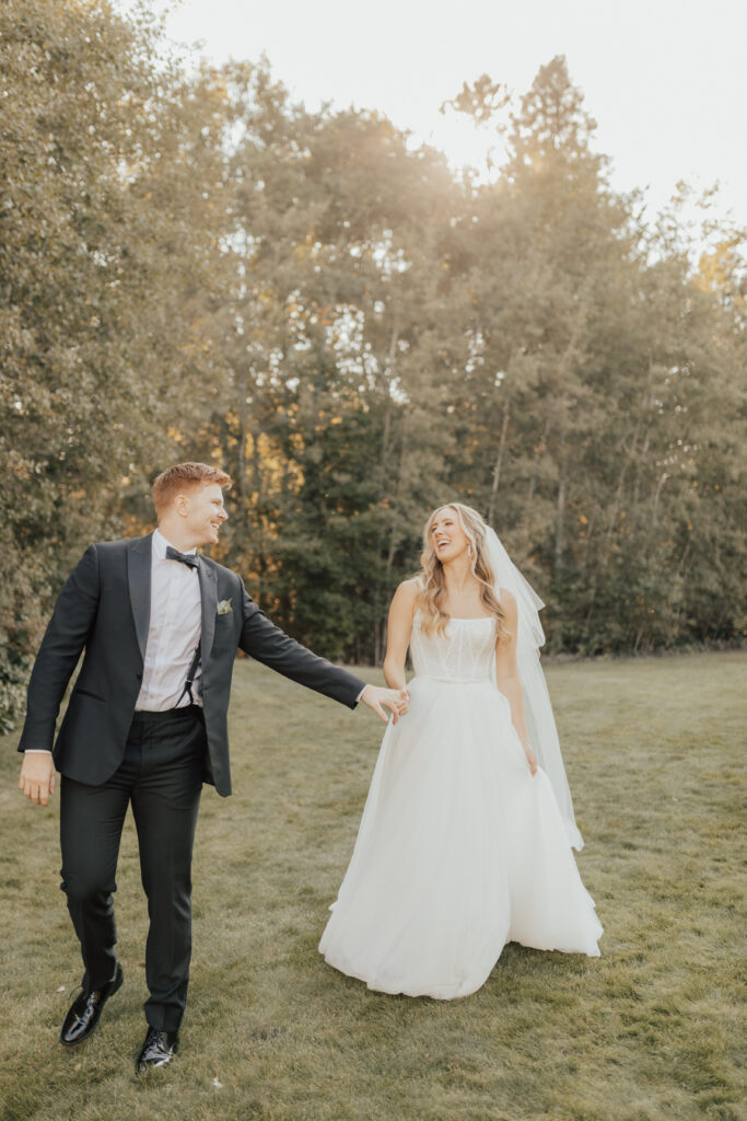 bride and groom laughing photography garden wedding