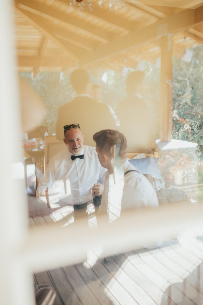 father of groom and groom moment getting ready wedding day